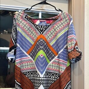 Blue and Orange Graphic Blouse with Dynamic Patterns